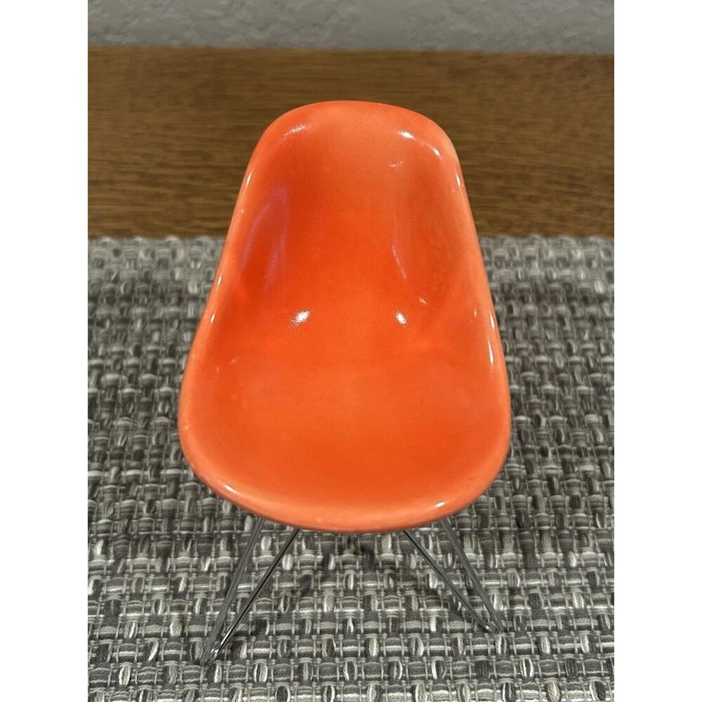 Miniature MCM Eames Chair Orange 5” Tall Wire Legs